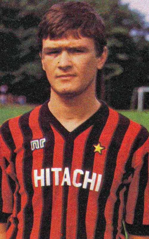 Aldo Serena in the Hitachi shirt of the 1982-83 Serie B campaign. On loan from Inter, the young centre-forward lent his headers to Castagner's rebuilt side as Milan clawed their way back to Serie A at the first attempt, sealing the Serie B title in the spring of 1983.