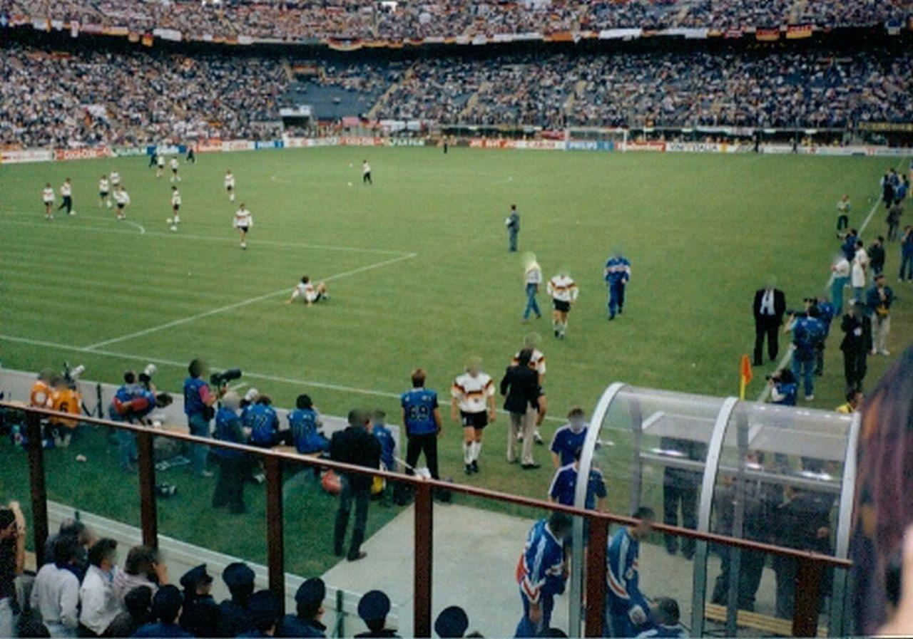 San Siro, 10 June 1990: West Germany beat Yugoslavia 4-1 as the World Cup comes to Milan's home. Weeks earlier, on 23 May in Vienna, Rijkaard's goal past Benfica had given Sacchi's Milan back-to-back European Cups — and the rebuilt stadium, its new third ring towering over Italia '90, was now the grandest stage in football.