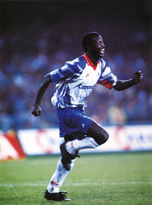 George Weah celebrates a goal for PSG at Napoli's San Paolo, October 1992 — the striker Milan signed in the summer of 1995, and the Ballon d'Or of that December.