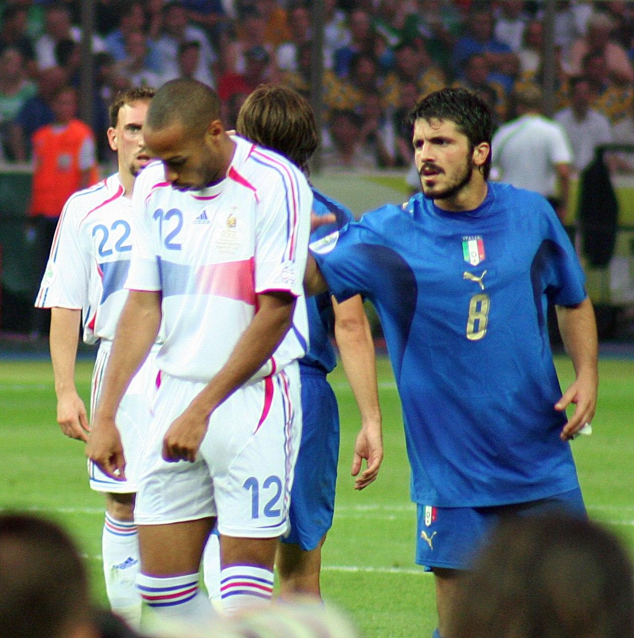 Gennaro Gattuso snapping at Thierry Henry's heels in the World Cup final, Berlin, 9 July 2006 — one of five Milan players in the Italy squad that came home world champions in the summer Calciopoli tore Serie A apart.