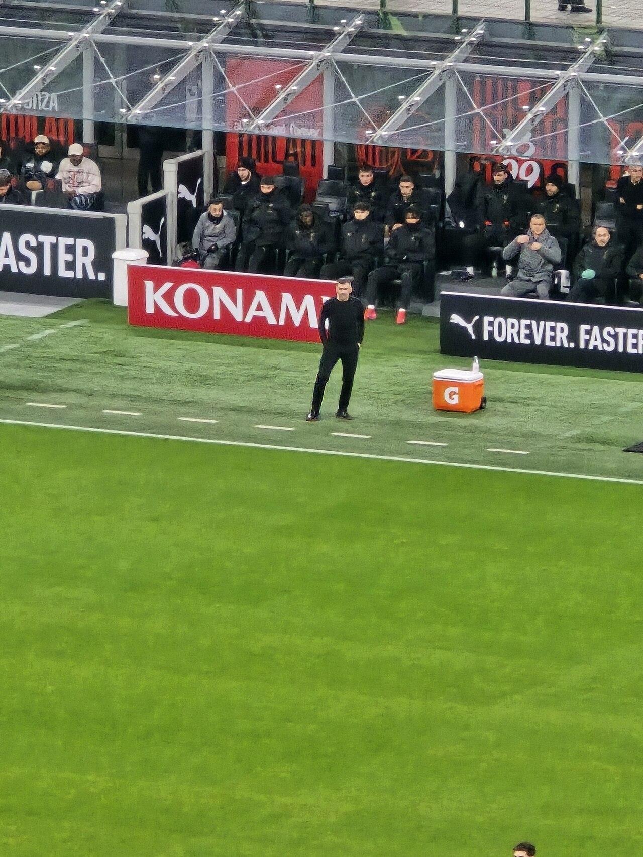 Sérgio Conceição alone on the San Siro touchline against Cagliari, 11 January 2025 — his first home league match after winning the Supercoppa in his opening week. The trophy was as good as the year got: Feyenoord in February, Bologna in May, eighth place and no Europe.