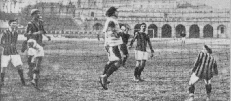 The first championship derby: Milan 3-2 Internazionale, Campo di Porta Monforte, 10 January 1909 — action in front of the Inter goal, with goalkeeper Carlo Cocchi making a save.