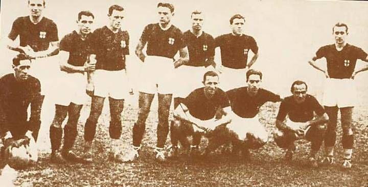 The Milan squad of 1936-37, posed on the pitch with the red cross of the city of Milano on their chests — the season photograph of the club re-badged 'Milan Associazione Sportiva' under the regime's italianisation of names.