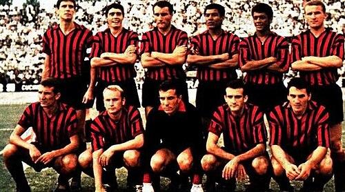 A Milan line-up from the 1964-65 season — the side that led Serie A for most of the year, seven points clear in January, before Inter's comeback stole the scudetto. Cesare Maldini and Giovanni Trapattoni are among those pictured.