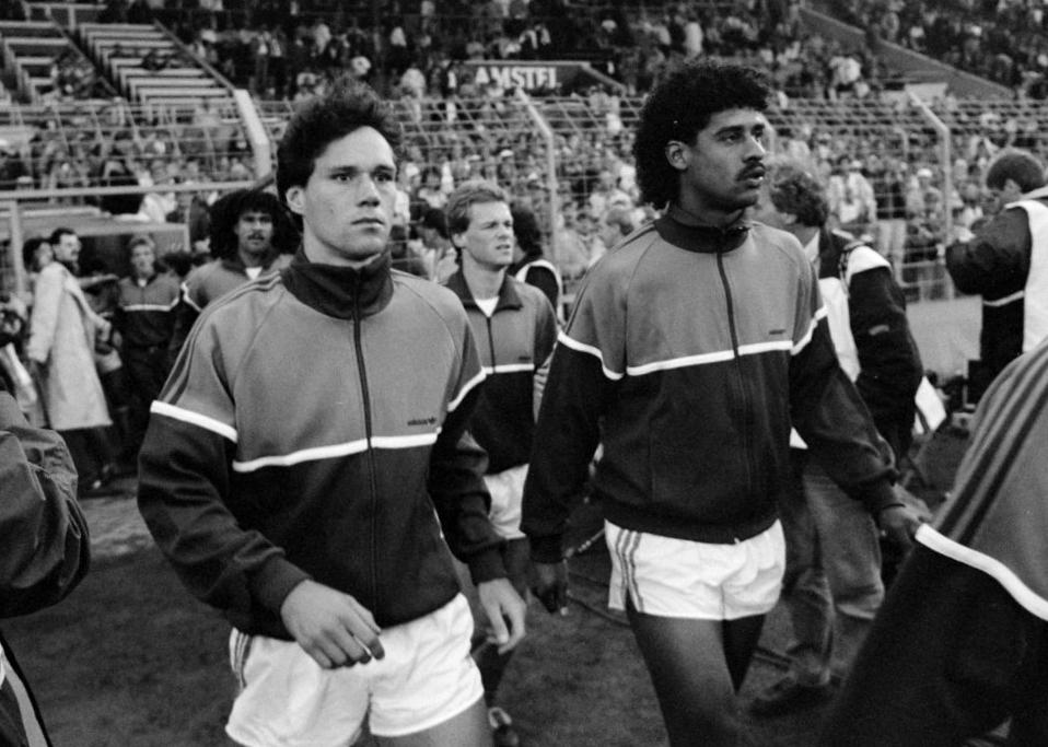 Marco van Basten (left) and Frank Rijkaard walk out for Netherlands v Wales, World Cup qualifier, 14 September 1988. That summer Berlusconi had completed the Dutch trio: Rijkaard joined Gullit and Van Basten at Milanello, and Sacchi's machine turned its eyes to the European Cup.